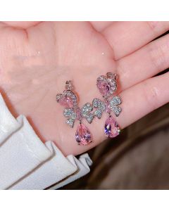 Gentle peach blossom drop zircon bow earrings